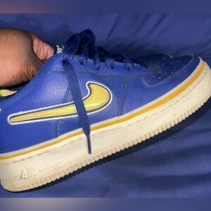 Blue and yellow Nike  7y